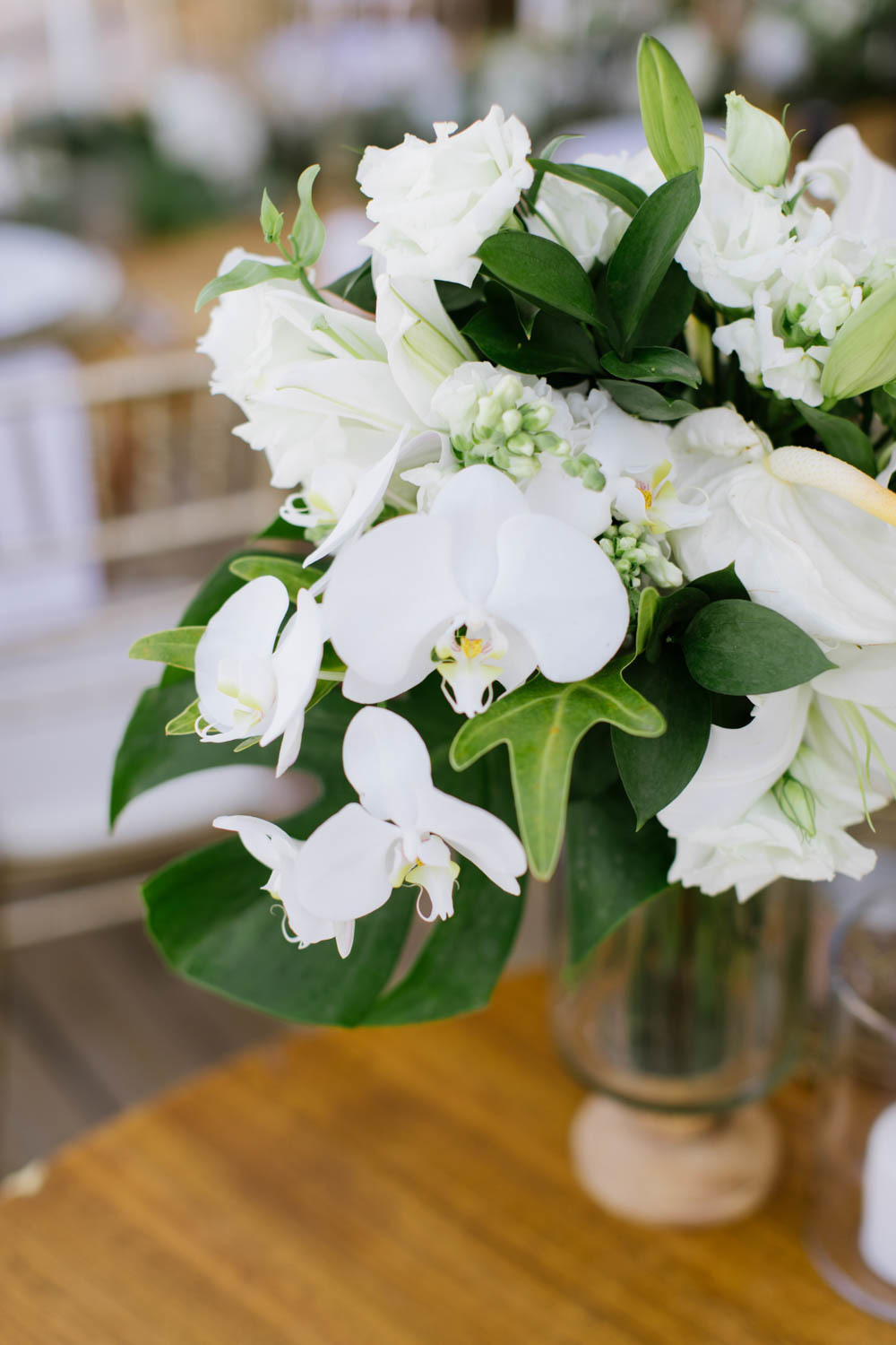 A bouquet of white flowers on the table.