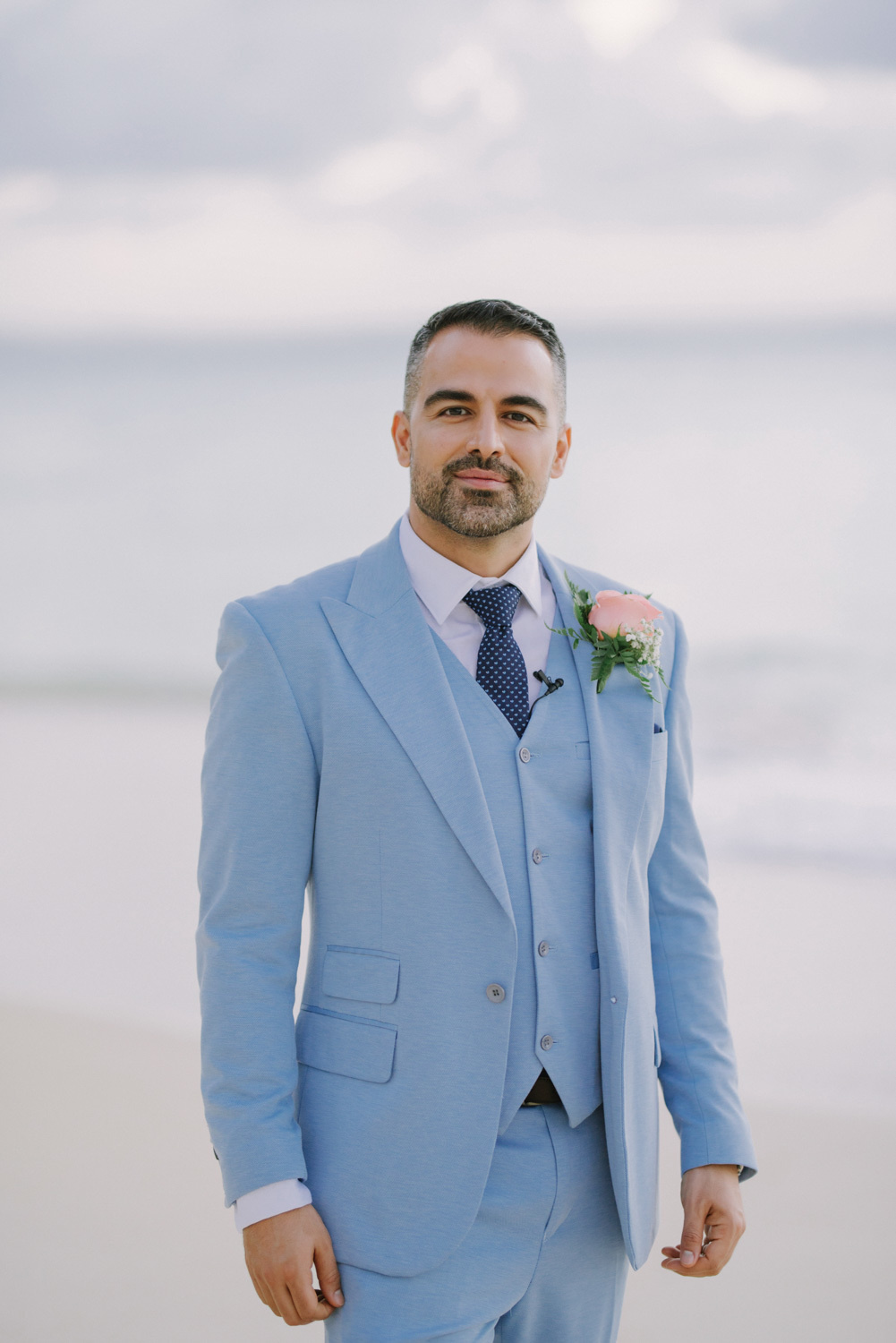 Groom on the background of a foggy dawn.