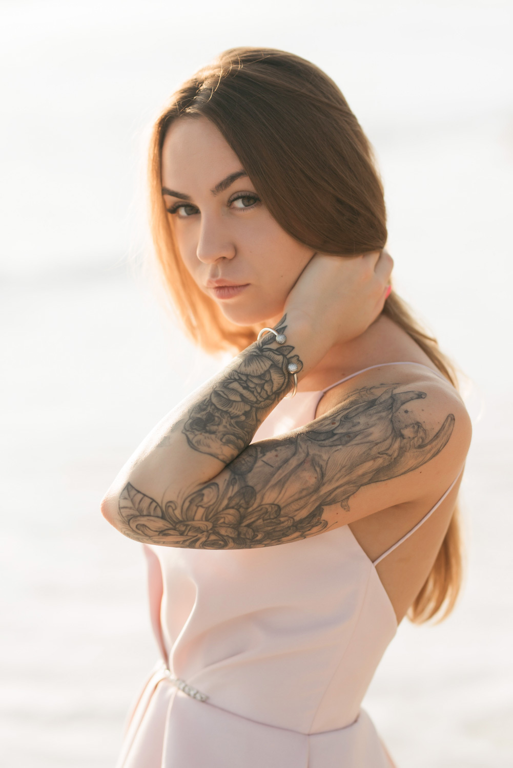 The bride's face with loose brown hair.