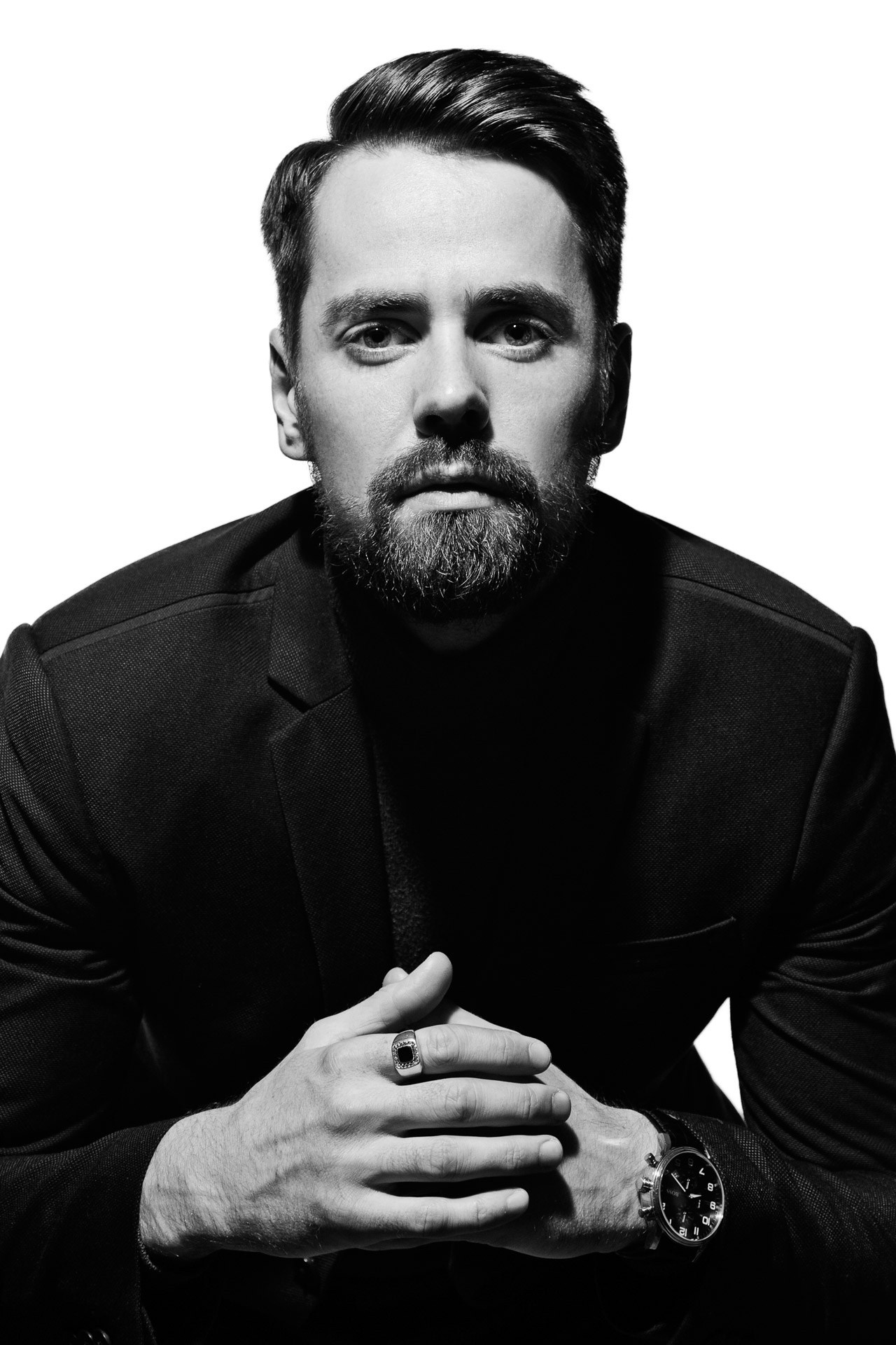 Black-and-white portrait of a male model for agency portfolio submission