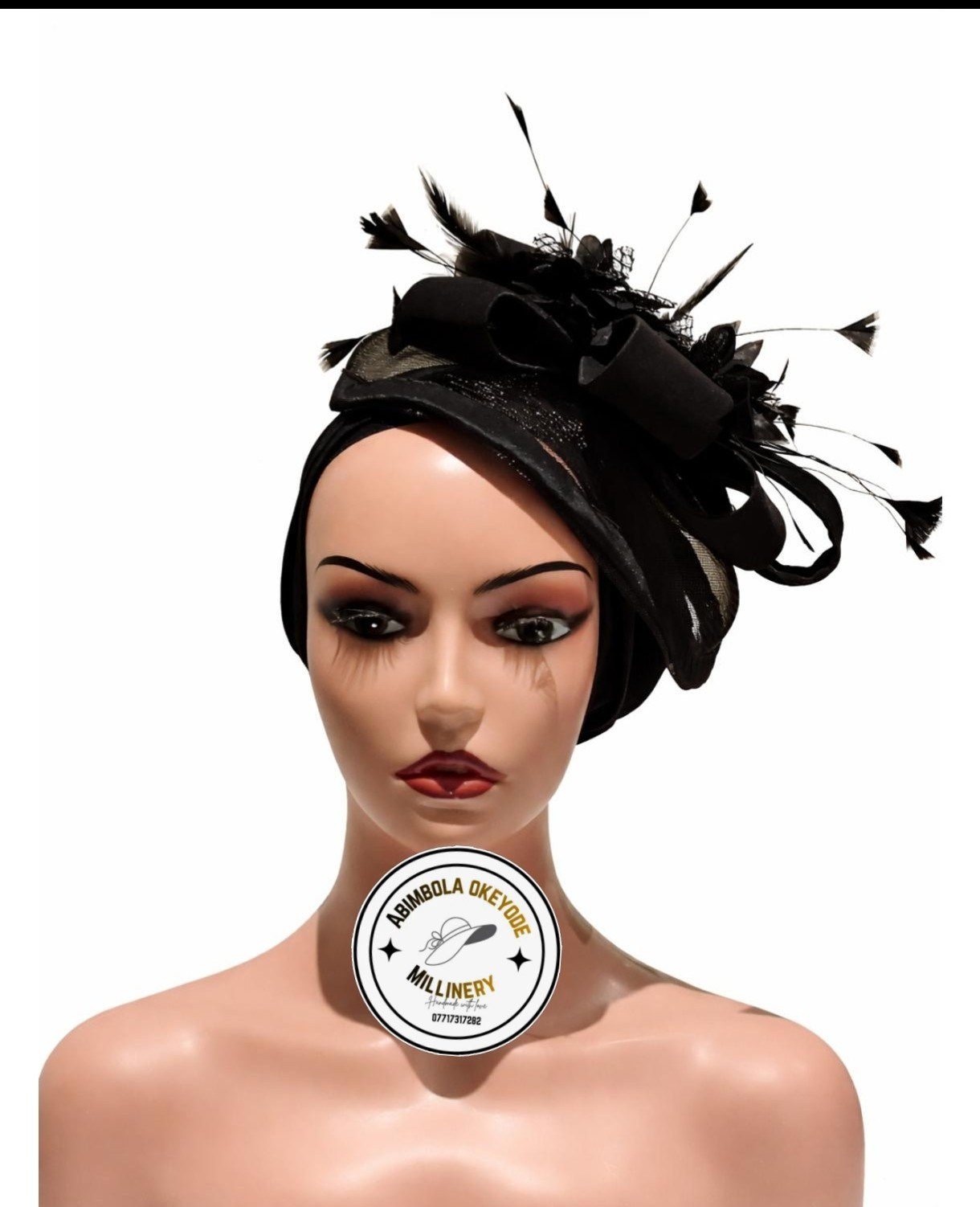Pleated turban with attached fascinators. A milliner in Hull, UK Abimbola Okeyode