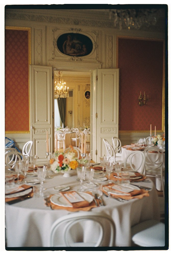 Reception table set for luxury wedding in ornate dining room