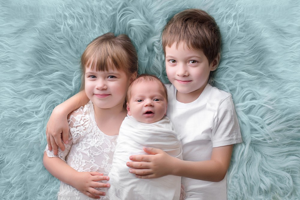 Sesja noworodkowa z rodzicami i rodzeństwem - Natalia Lucko