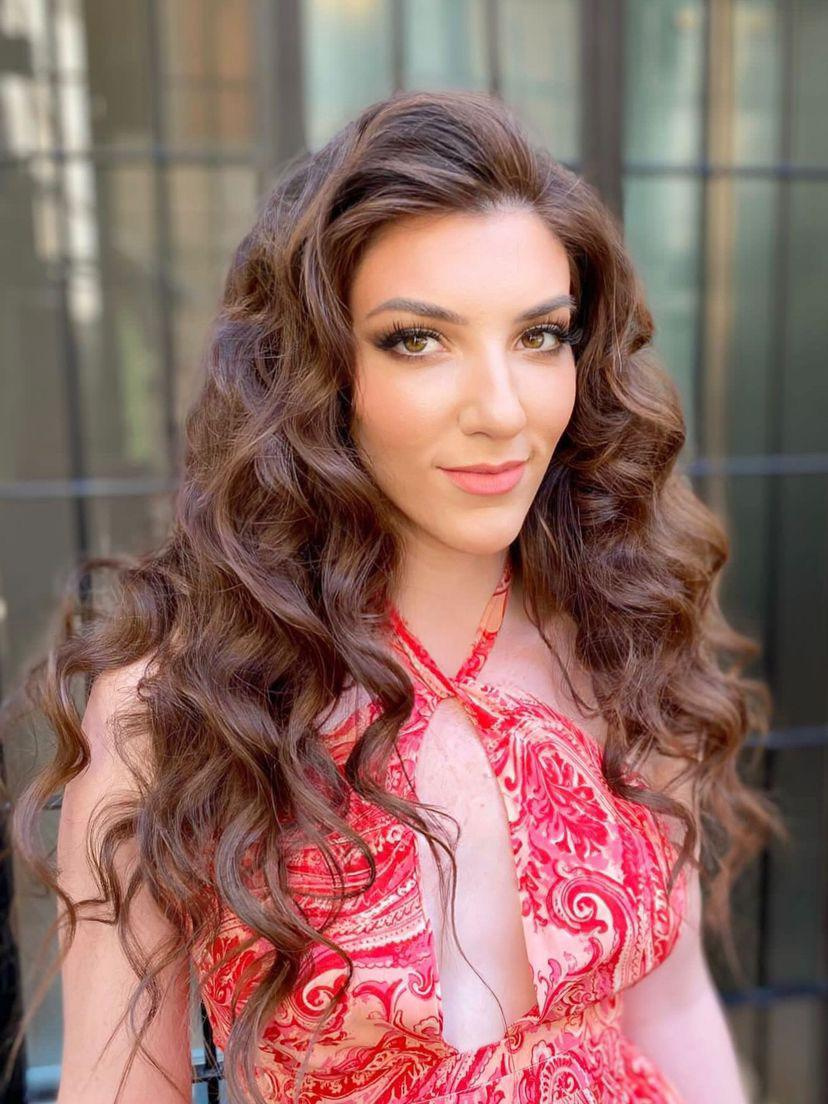 big waves on long brown natural hair with extensions