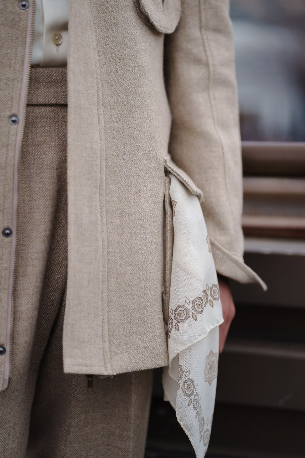Close up of beige tailored outfit and scarf at Pitti Uomo Florence