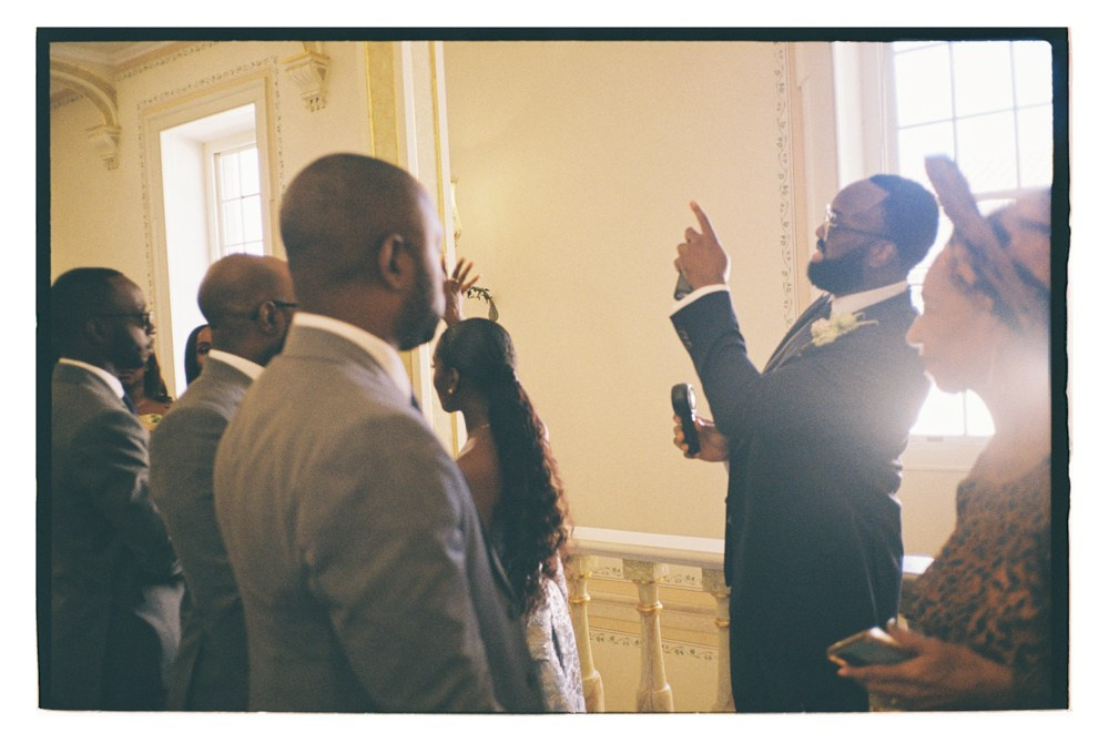 Guests gathered indoors during Nigerian wedding celebration in Portugal