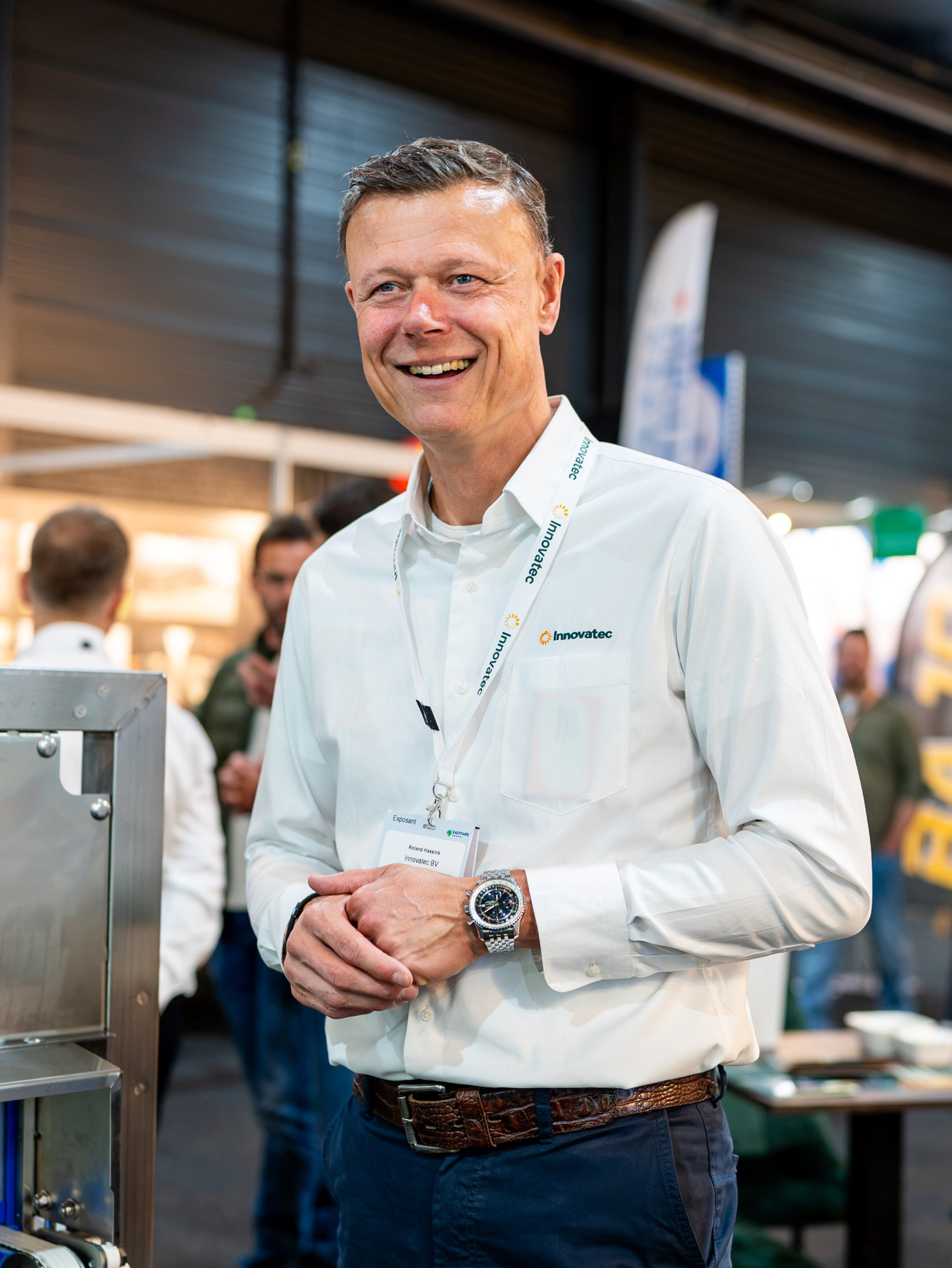 Portrait of a company representative at an exhibition