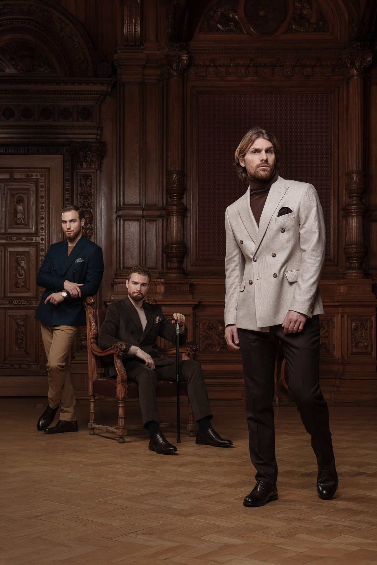 Men’s fashion editorial group portrait in classic interior