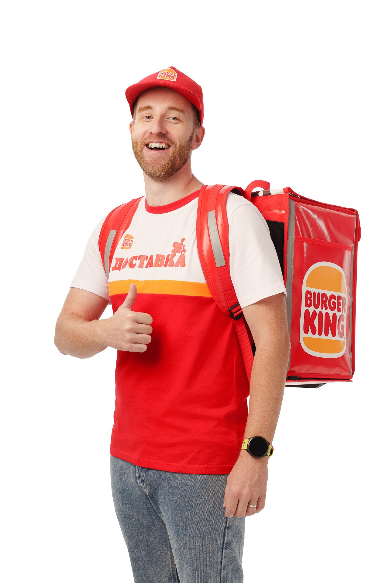 Burger King delivery courier with branded backpack, smiling, studio portrait