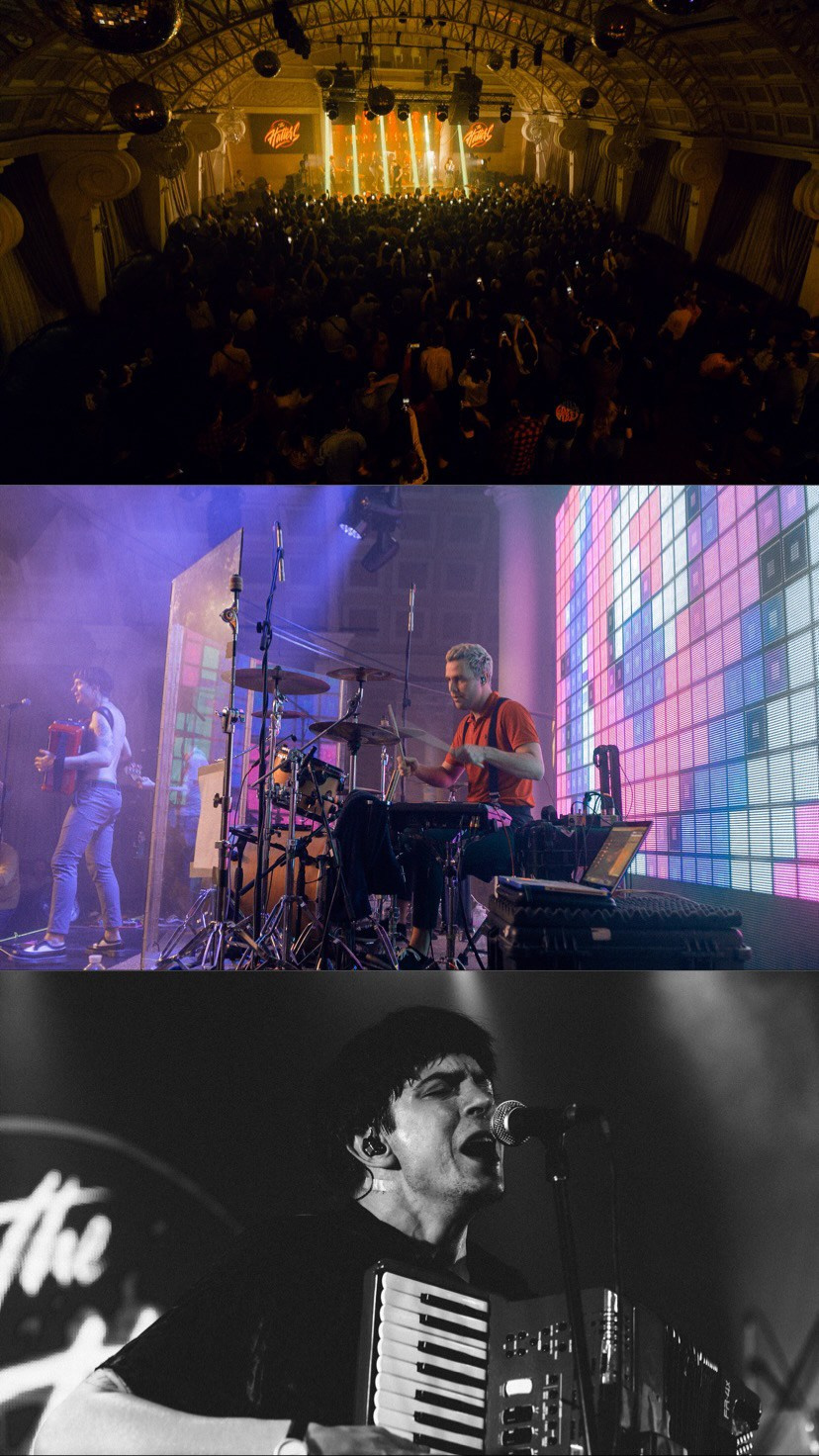 The musician's movements amid the intense flood of light on stage