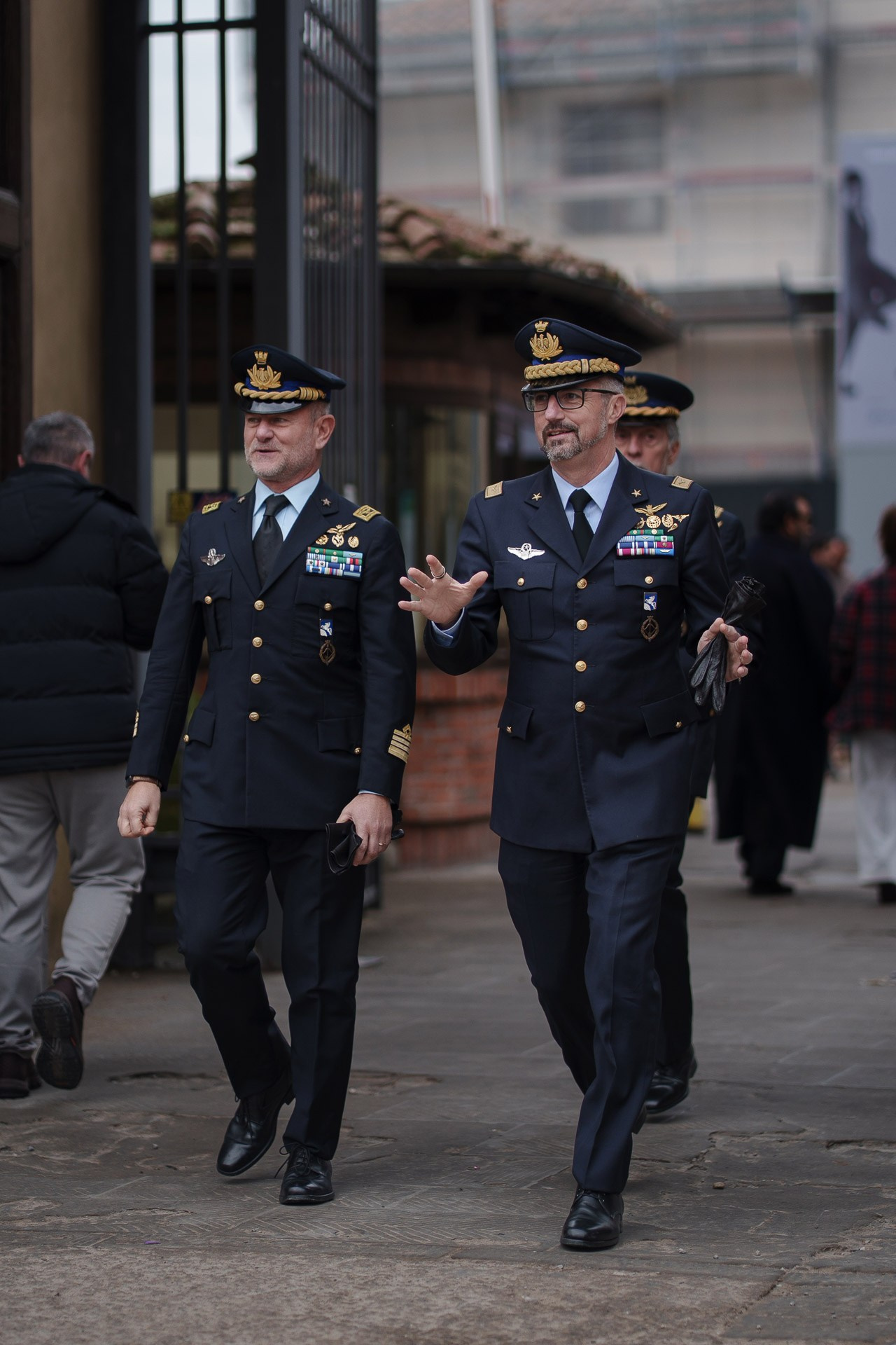 Italian military officers in formal uniform walking at Pitti Uomo Florence