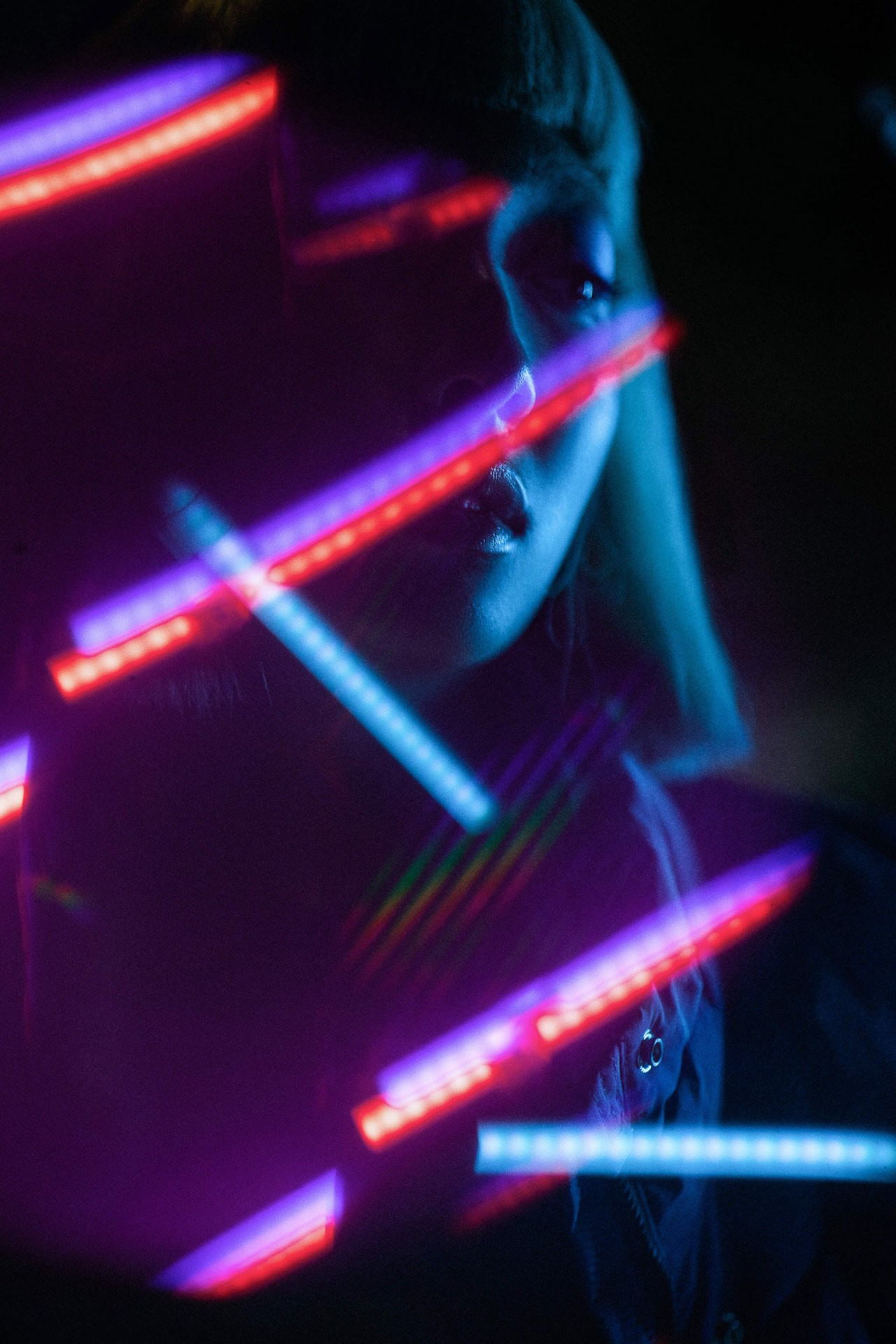 Creative portrait with neon light effects, fashion photography