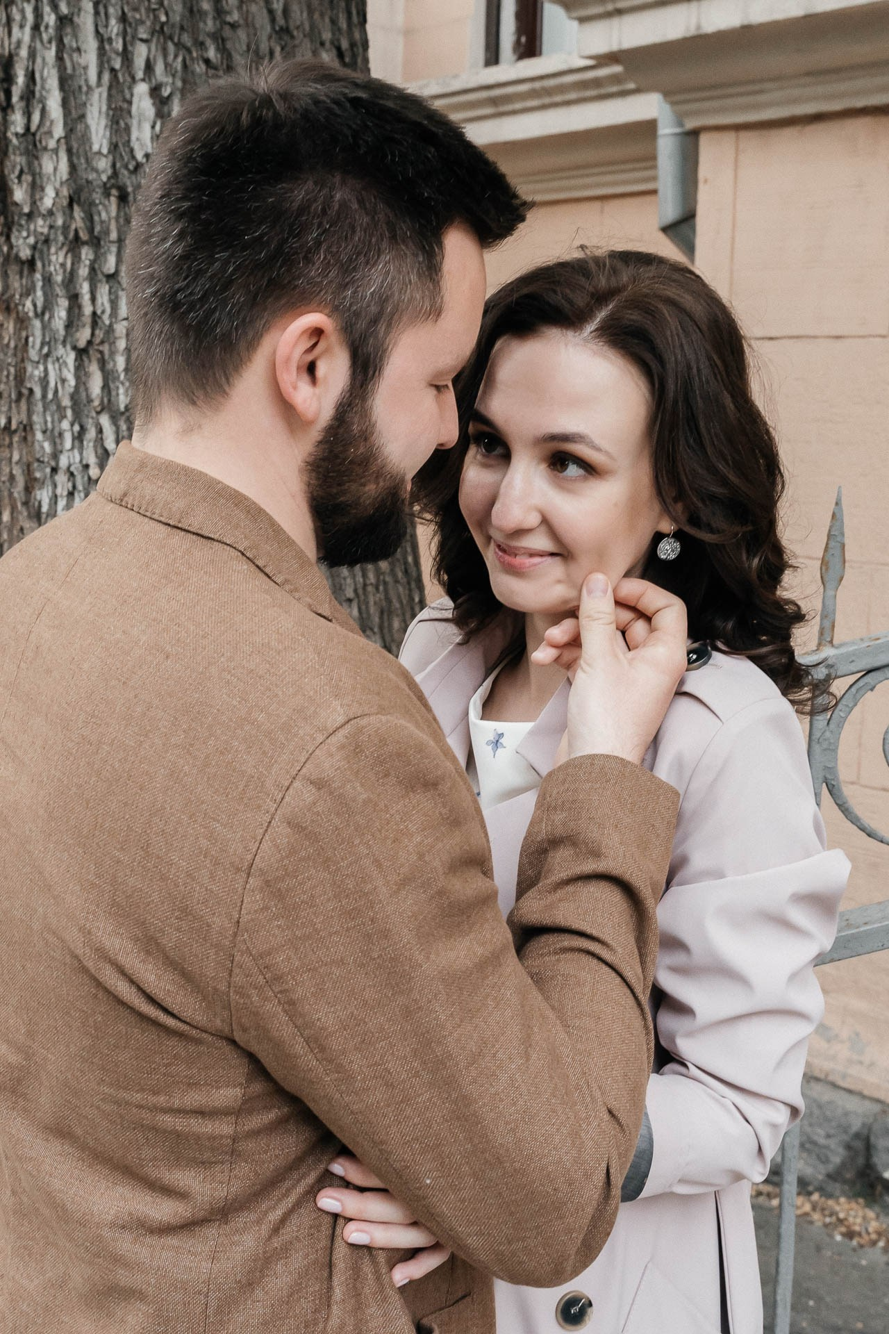 Toronto candid engagement photography Ksenia and Artem sharing a kiss.