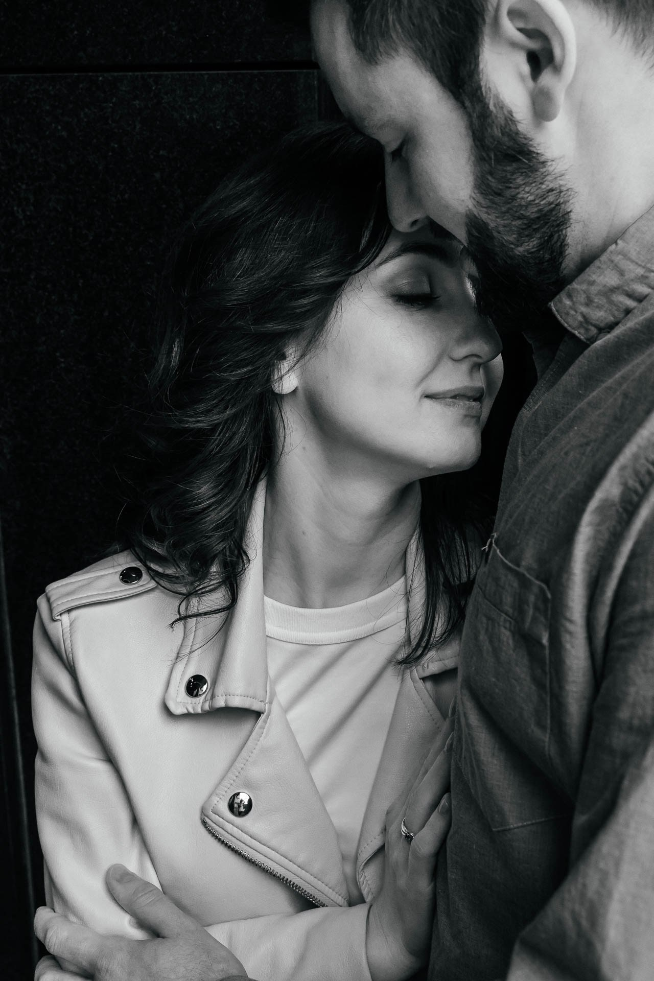 Toronto candid engagement photography Ksenia and Artem sharing a kiss.