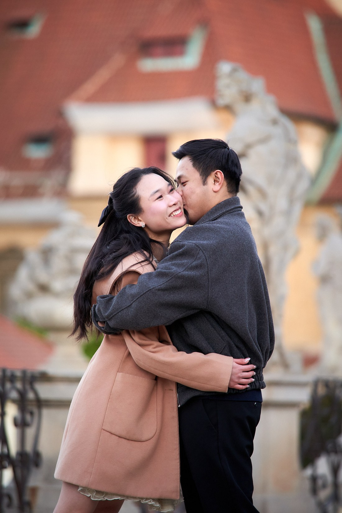 Candid engagement couple portrait Vrtba Garden Prague castle backdrop