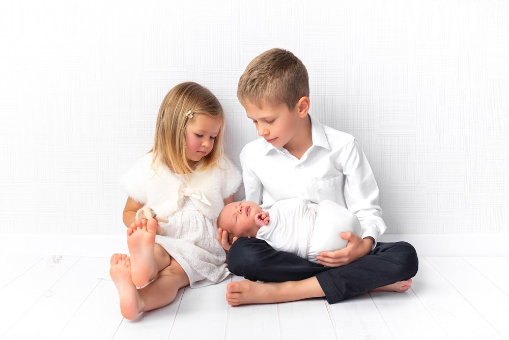 Sesja noworodkowa z rodzicami i rodzeństwem - Natalia Lucko