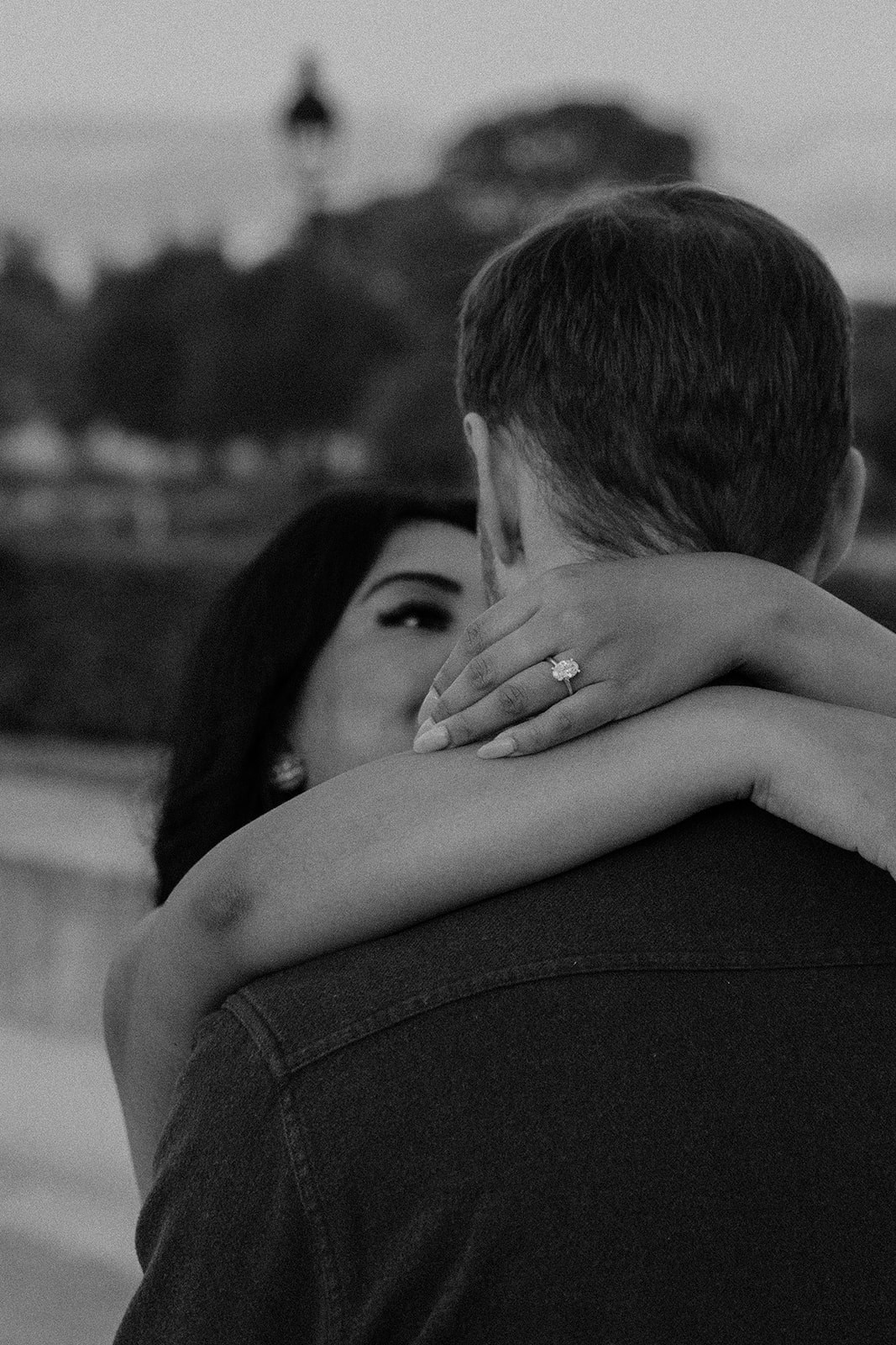 Engagement ring on the bride to be while being in Paris