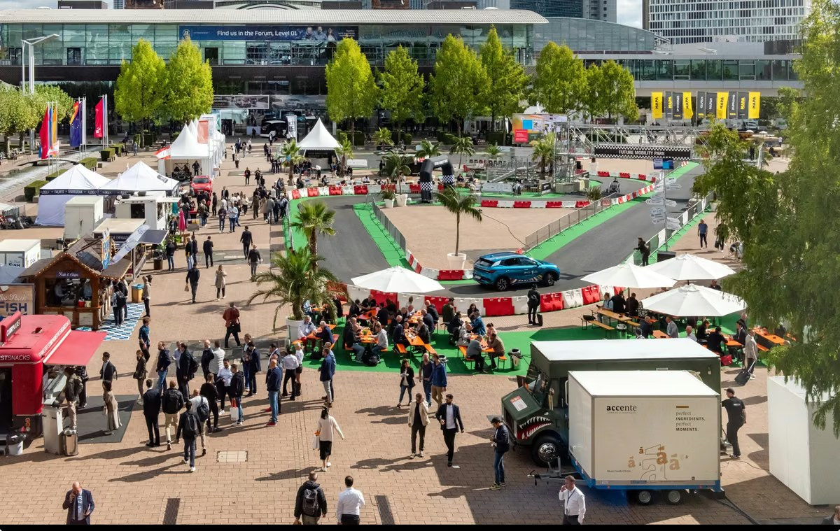 Aerial view of an outdoor automotive exhibition in the UAE