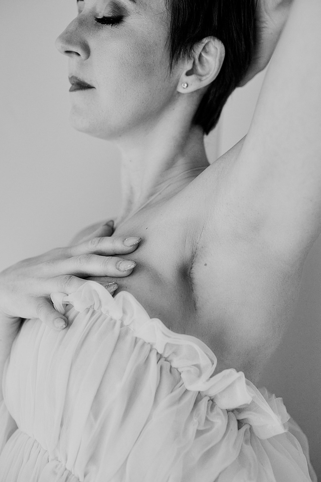 woman breast cancer survivor touching the scars on her body 