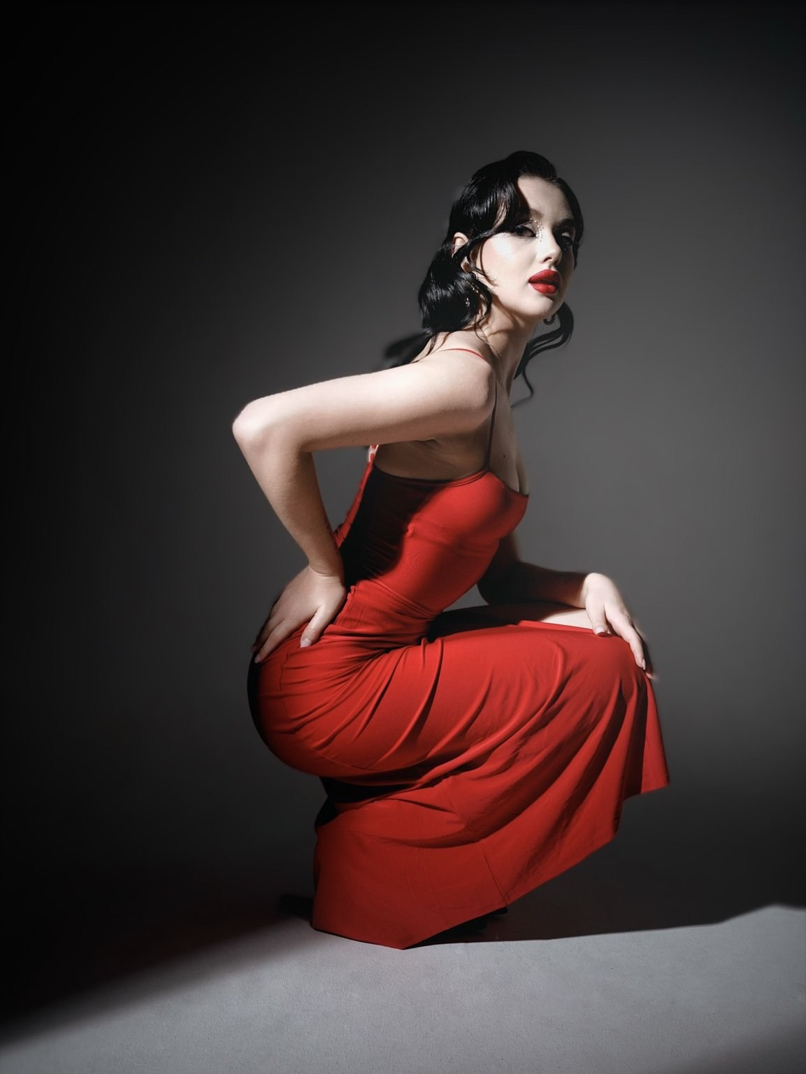 Fashion photoshoot in Plovdiv – elegant portrait of a woman in a red dress