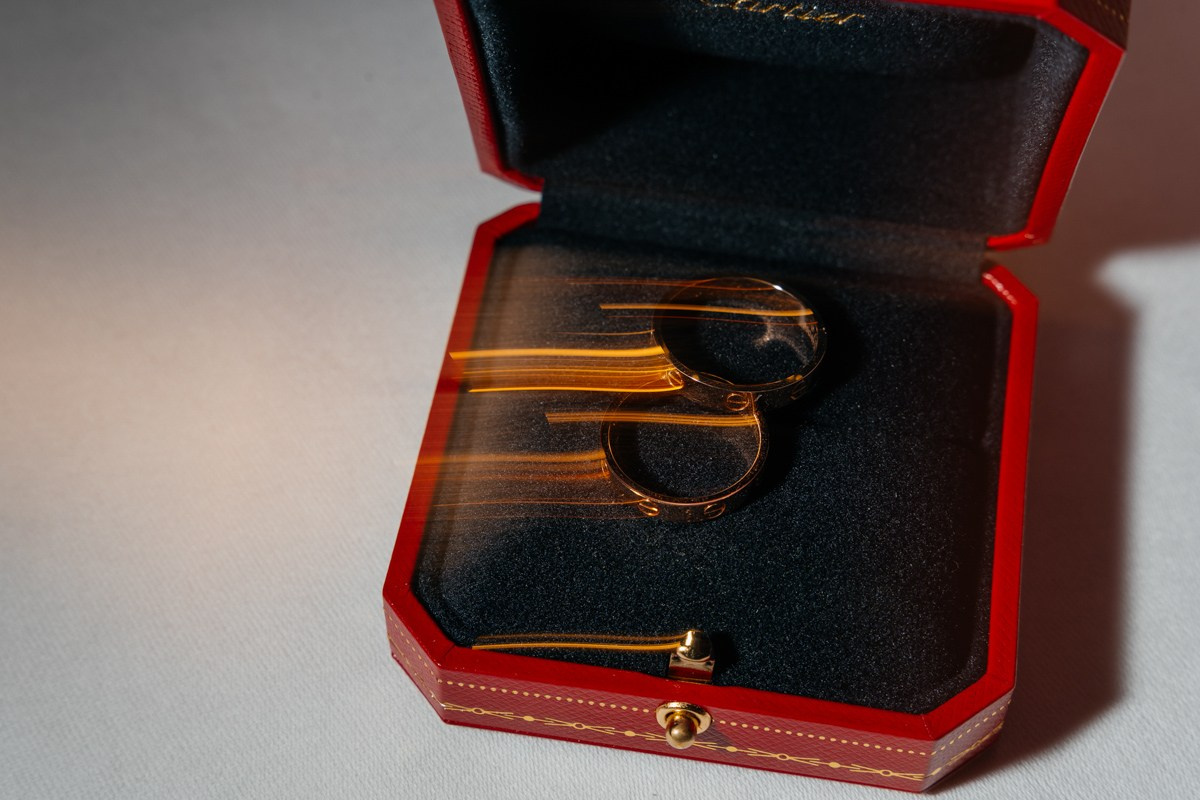 cartier wedding rings on the table