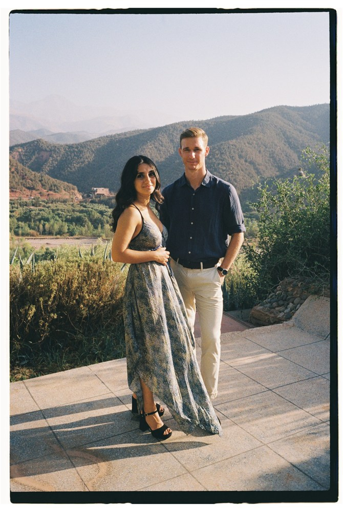 Couple standing on terrace during Morocco destination wedding portraits