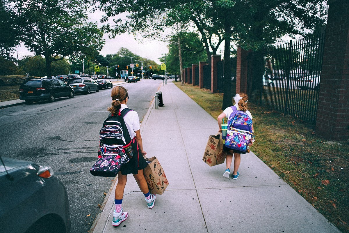 10 years ago Today — First day of school (Sophie and Eva) — Sony A7R II + Ultron 21mm f1.8 (Everything without autofocus). Emin Kuliyev — Award-Winning Wedding Photojournalist NYC & USA | Best Wedding Photographer Known for Candid, Timeless Moments