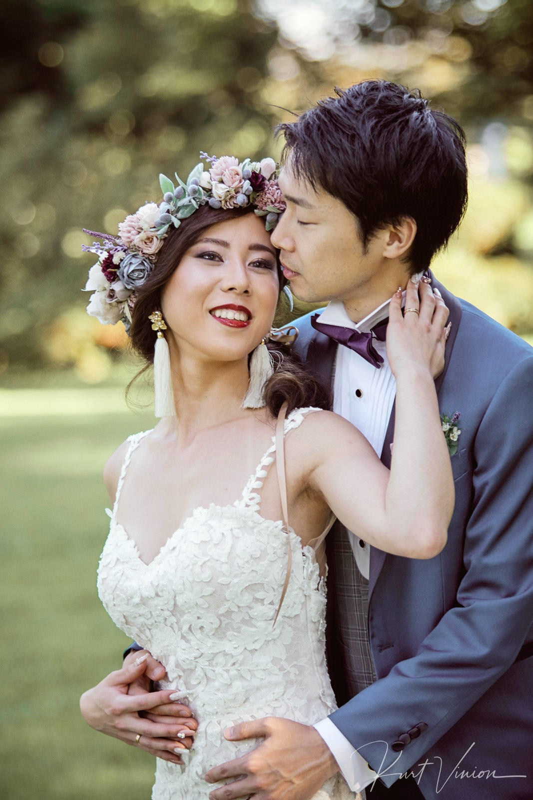 Intimate newlyweds evening portrait Vila Bled grounds Lake Bled.
