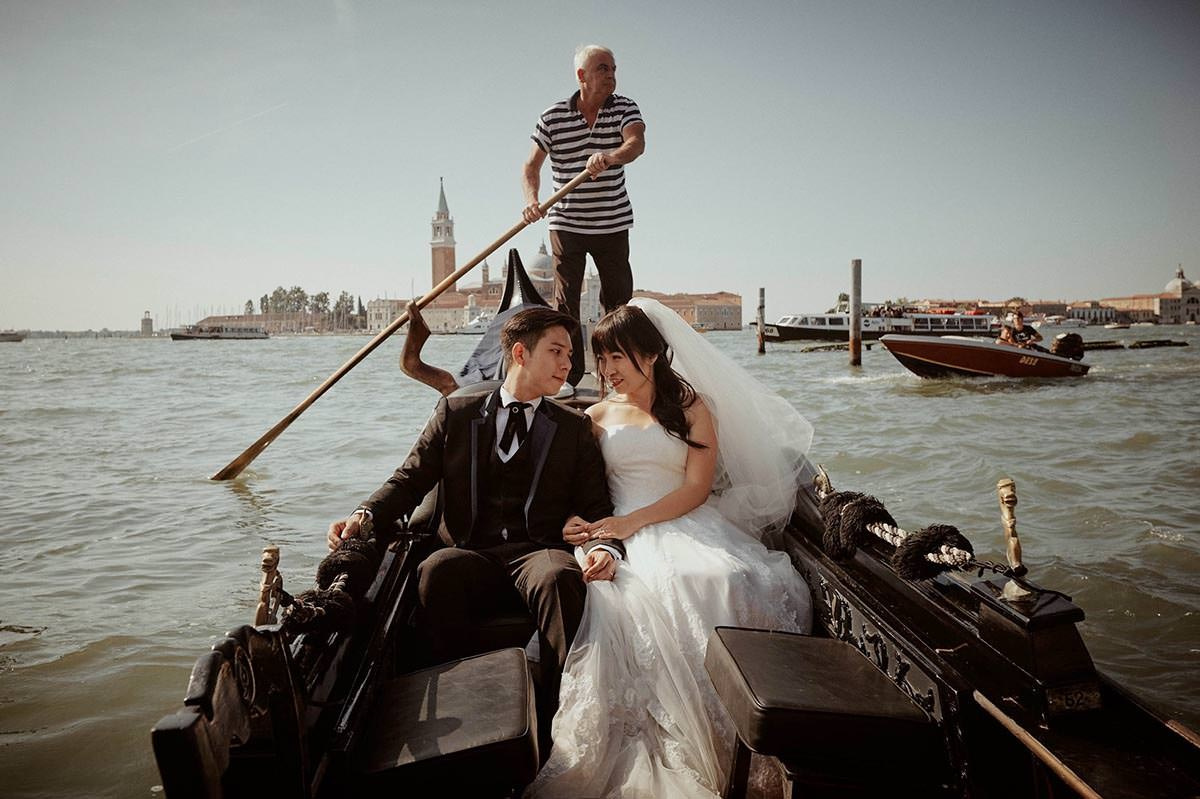 Daisy and Luis enjoying a private gondola ride in Venice