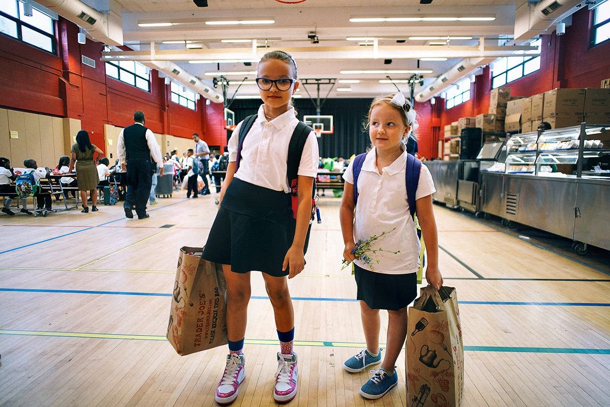 10 years ago Today — First day of school (Sophie and Eva) — Sony A7R II + Ultron 21mm f1.8 (Everything without autofocus). Emin Kuliyev — Award-Winning Wedding Photojournalist NYC & USA | Best Wedding Photographer Known for Candid, Timeless Moments