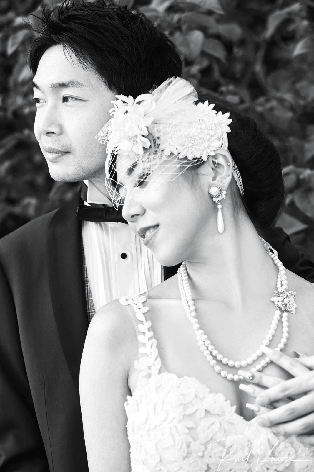 Classic black white portrait stylish Japanese newlyweds Lake Bled.