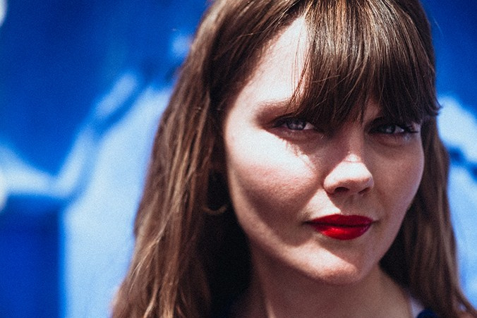 Ambient Light High Key Portraiture of a woman in the blue city of Chefchouen