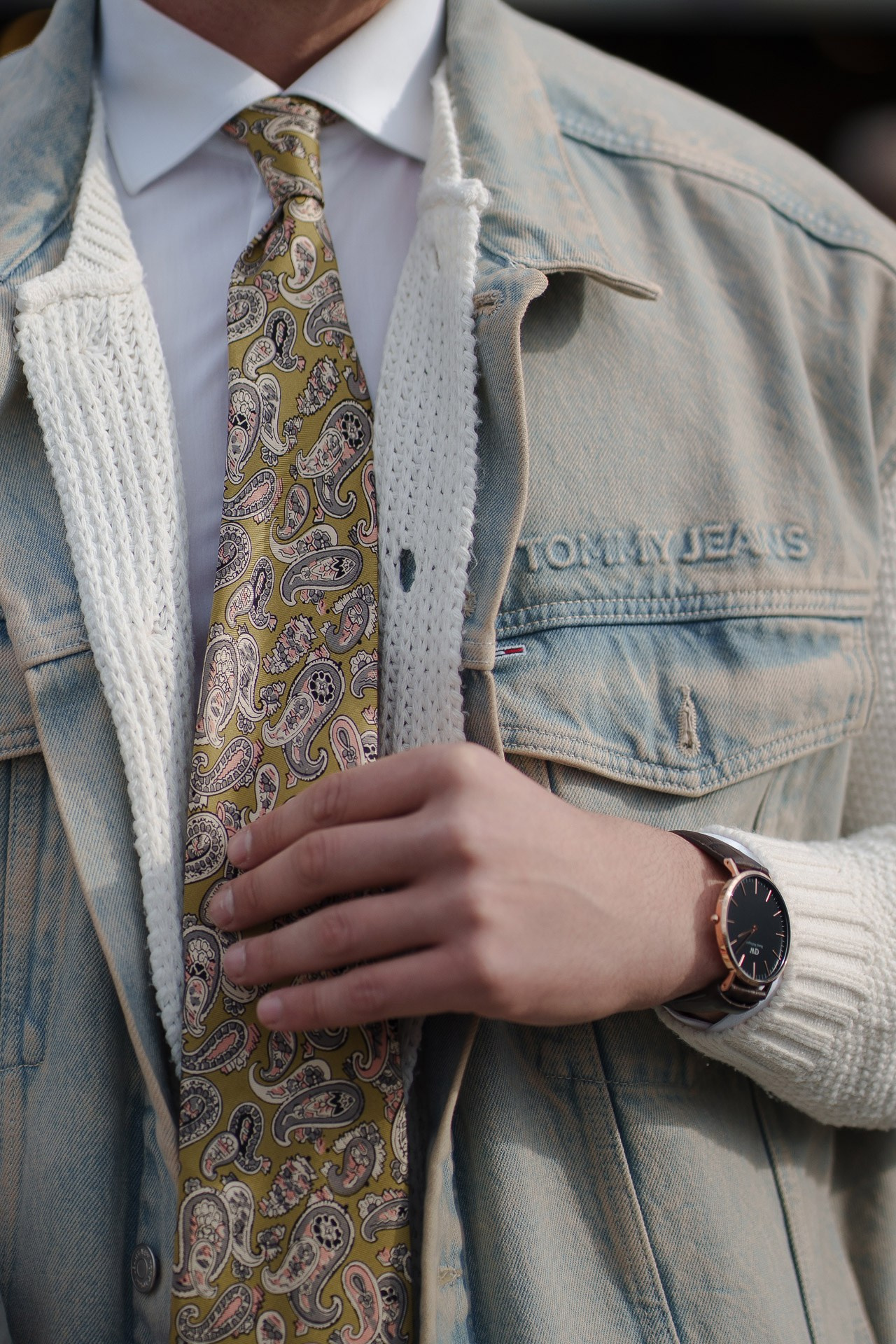 Close up of paisley tie and denim jacket at Pitti Uomo Florence