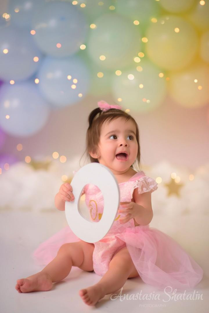 Rainbow cake smash Sacramento, Roseville, Rocklin baby photographer. Family photographer in Roseville, Rocklin, Folsom, Sacramento