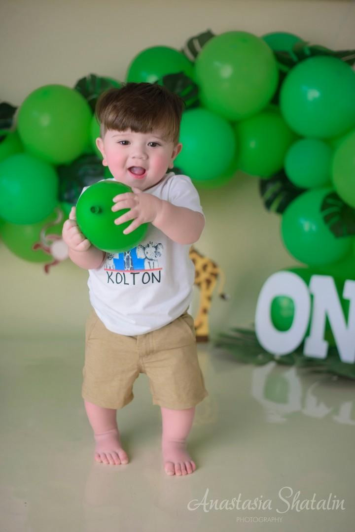 Tarzan jungle cake smash photography Sacramento. Family photographer in Roseville, Rocklin, Folsom, Sacramento