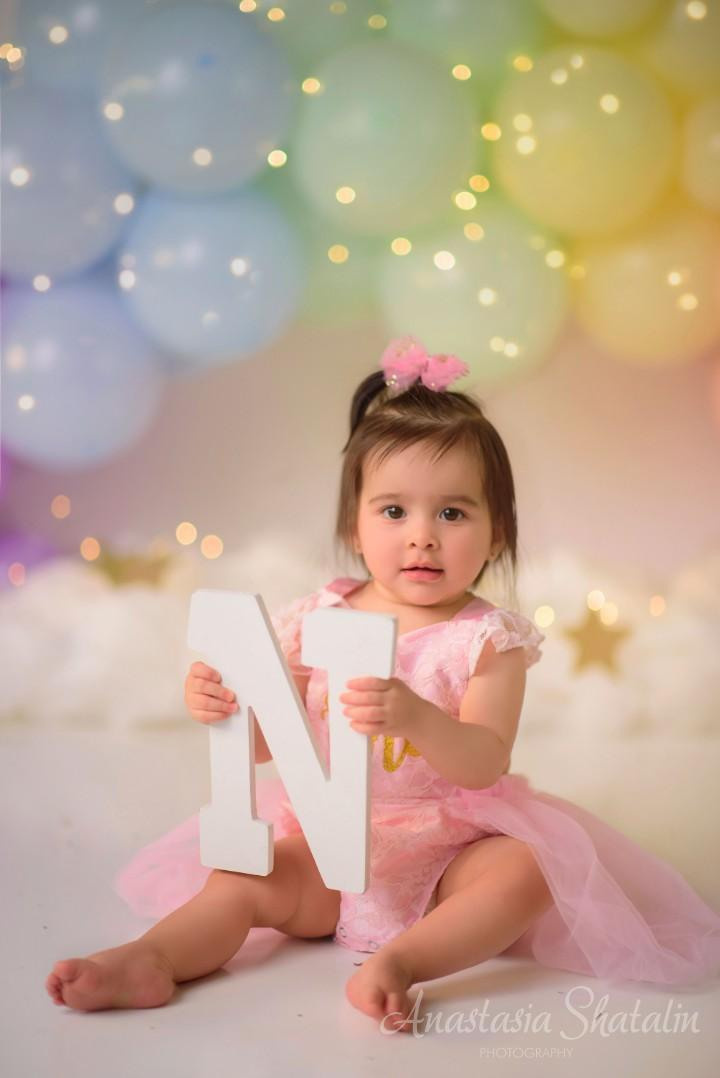 Rainbow cake smash Sacramento, Roseville, Rocklin baby photographer. Family photographer in Roseville, Rocklin, Folsom, Sacramento