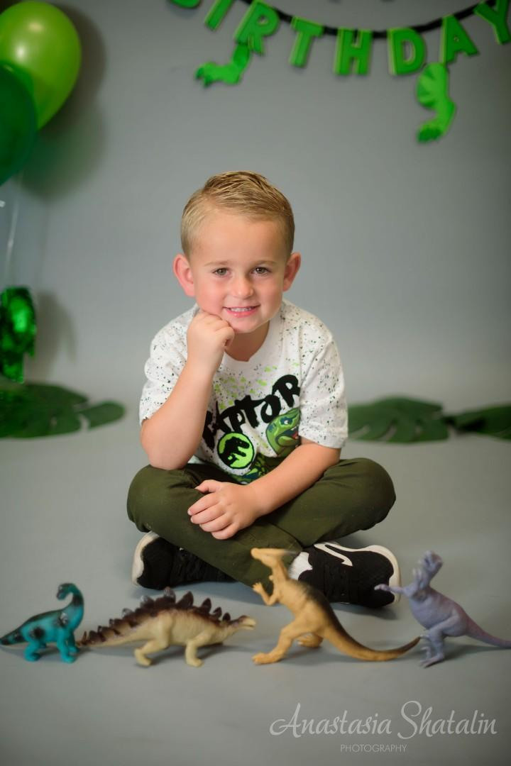 Dinosaur monster truck decorated birthday photography in Lincoln, CA. Family photographer in Roseville, Rocklin, Folsom, Sacramento