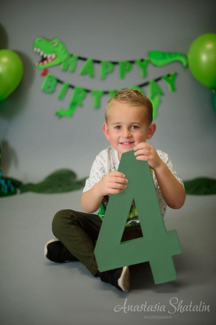 Dinosaur monster truck decorated birthday photography in Lincoln, CA. Family photographer in Roseville, Rocklin, Folsom, Sacramento