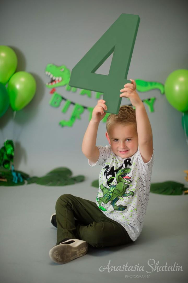 Dinosaur monster truck decorated birthday photography in Lincoln, CA. Family photographer in Roseville, Rocklin, Folsom, Sacramento