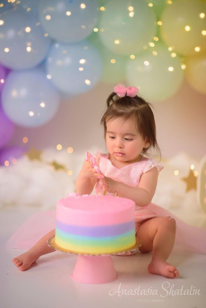 Rainbow cake smash Sacramento, Roseville, Rocklin baby photographer. Family photographer in Roseville, Rocklin, Folsom, Sacramento