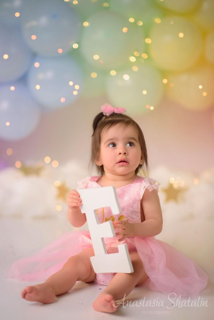 Rainbow cake smash Sacramento, Roseville, Rocklin baby photographer. Family photographer in Roseville, Rocklin, Folsom, Sacramento