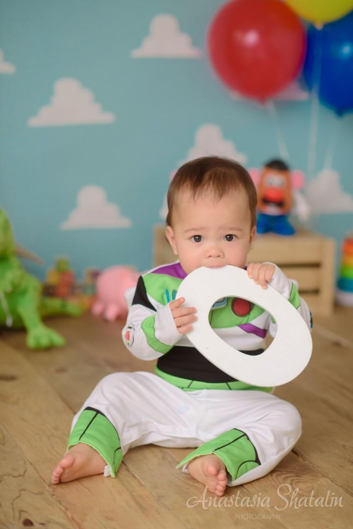 Toy story cake smash first Birthday photoshoot. Family photographer in Roseville, Rocklin, Folsom, Sacramento