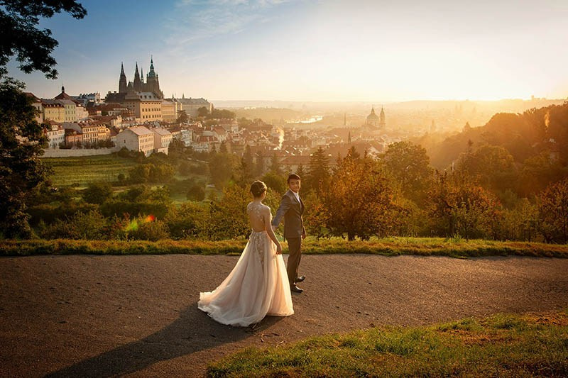 Malaysian couple Petrin Hill sunrise Prague panorama