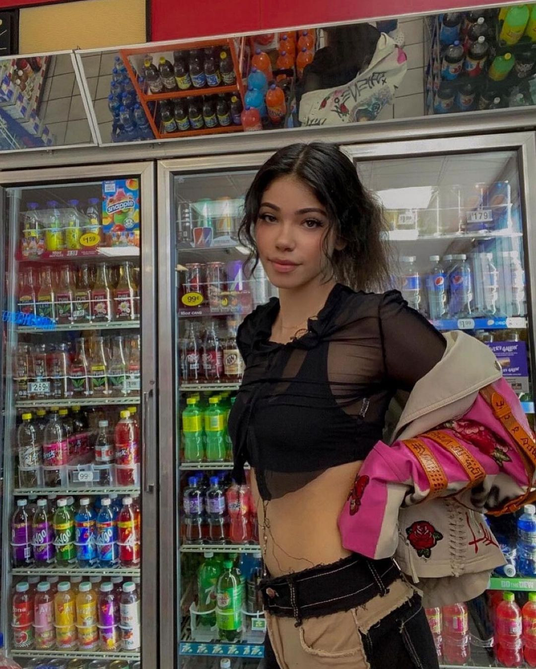 @victoriavonne2 wearing custom white leather Jhene Aiko jacket designed by Ke'Ondris