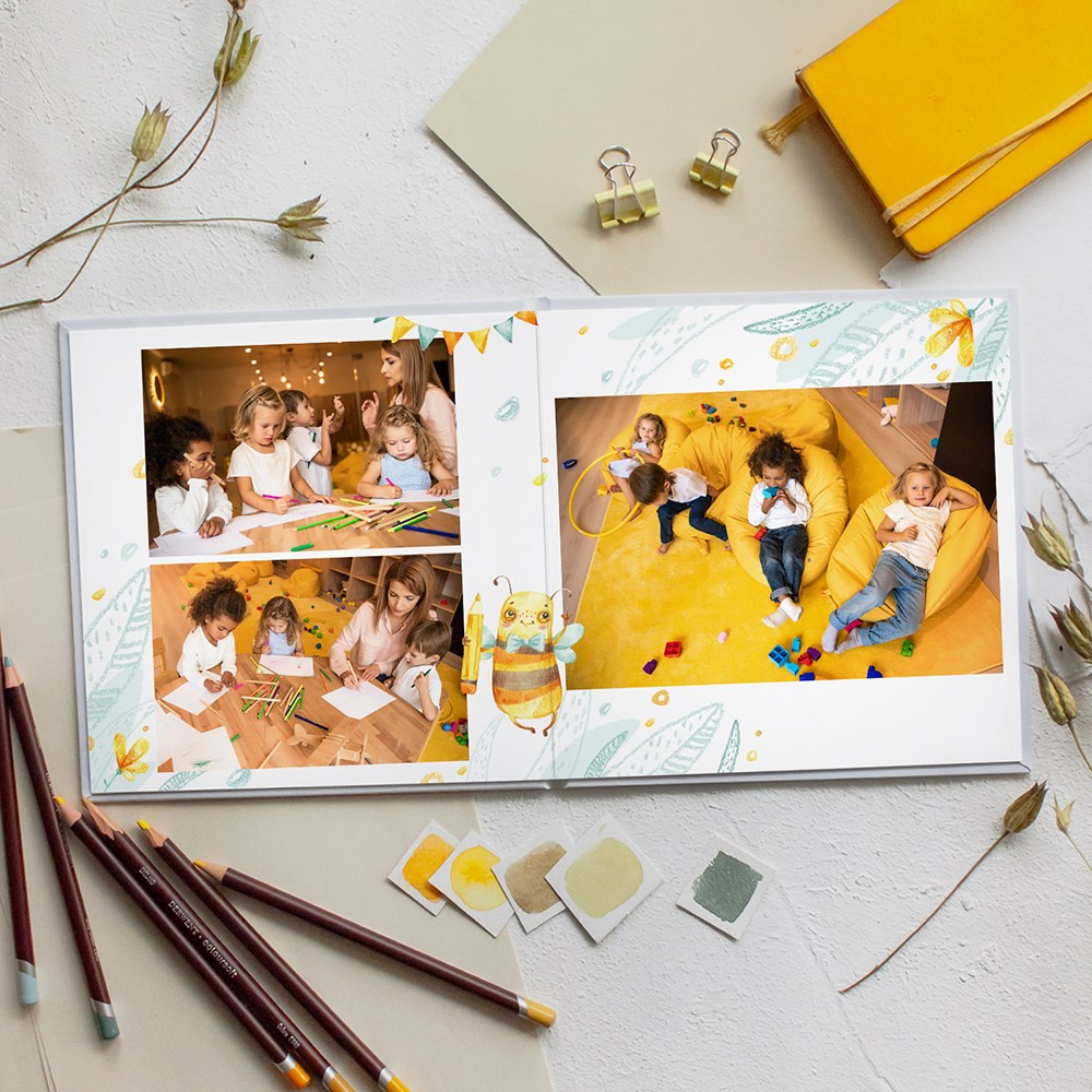 Групповое фото воспитанников детского сада с декоративными элементами пчёл