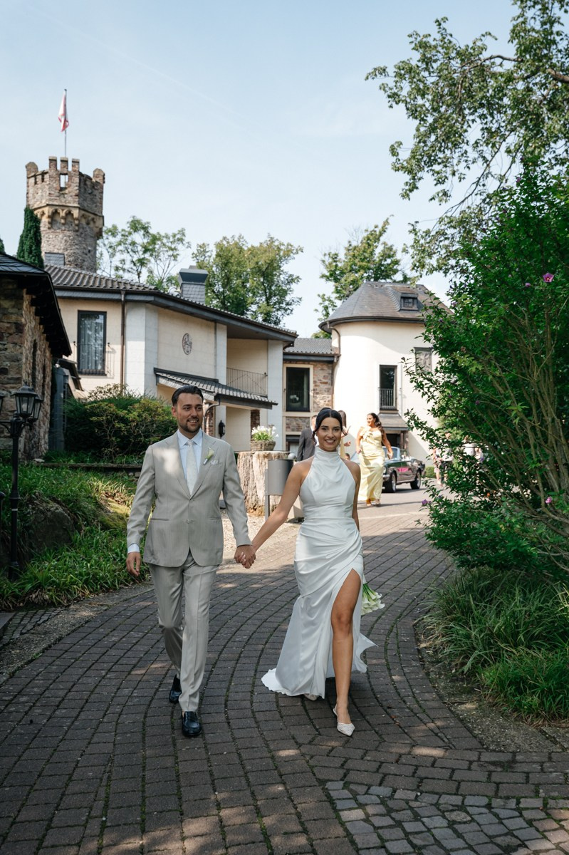 bride and groom coming to the guests