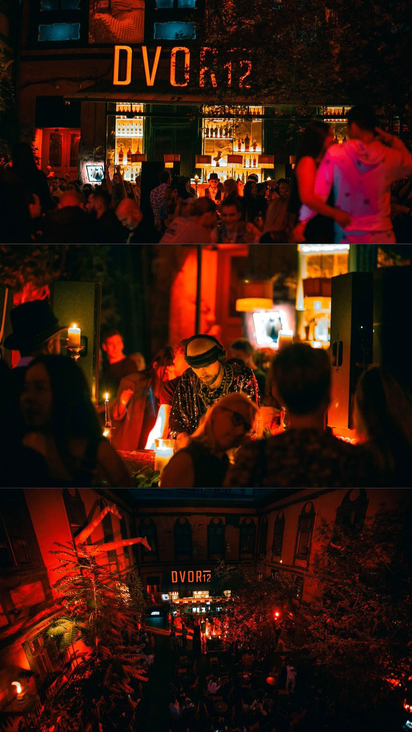 Bright neon lights and the lighting of the outdoor stage at a nighttime concert⁠