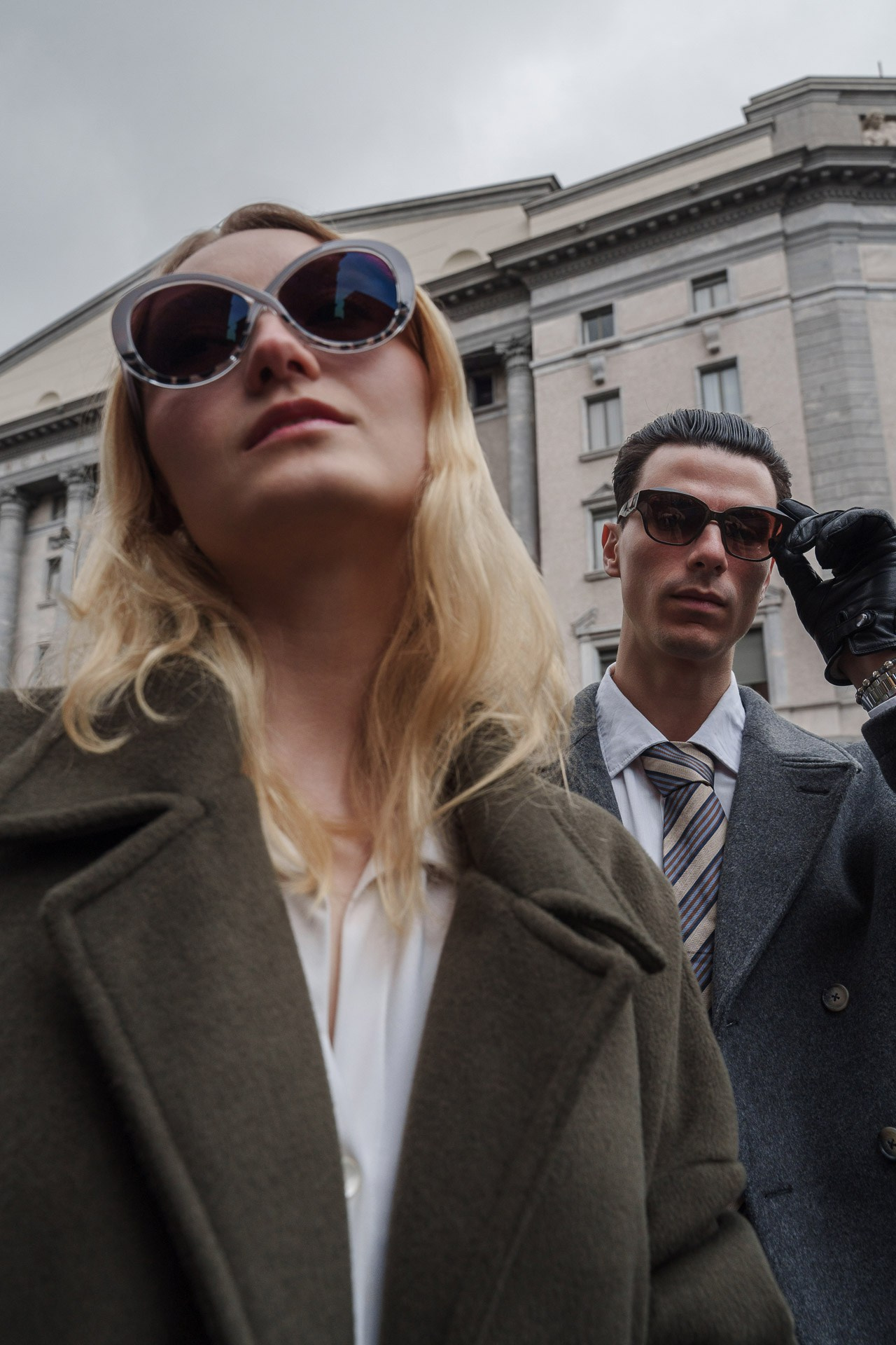 Street style couple portrait in Milan city center, fashion photography