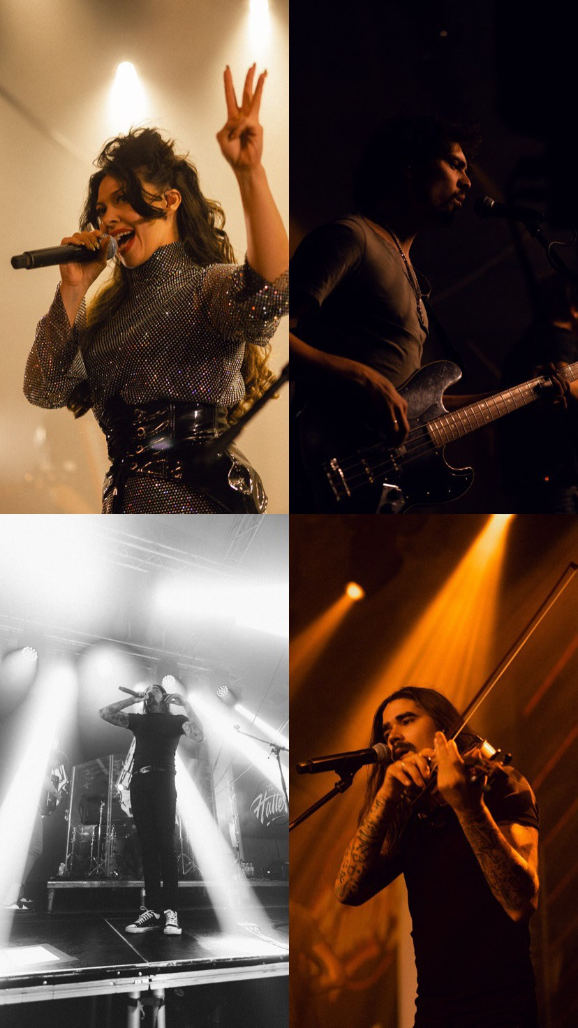 The warm, golden light shining on the performer against the backdrop of the dark night sky⁠