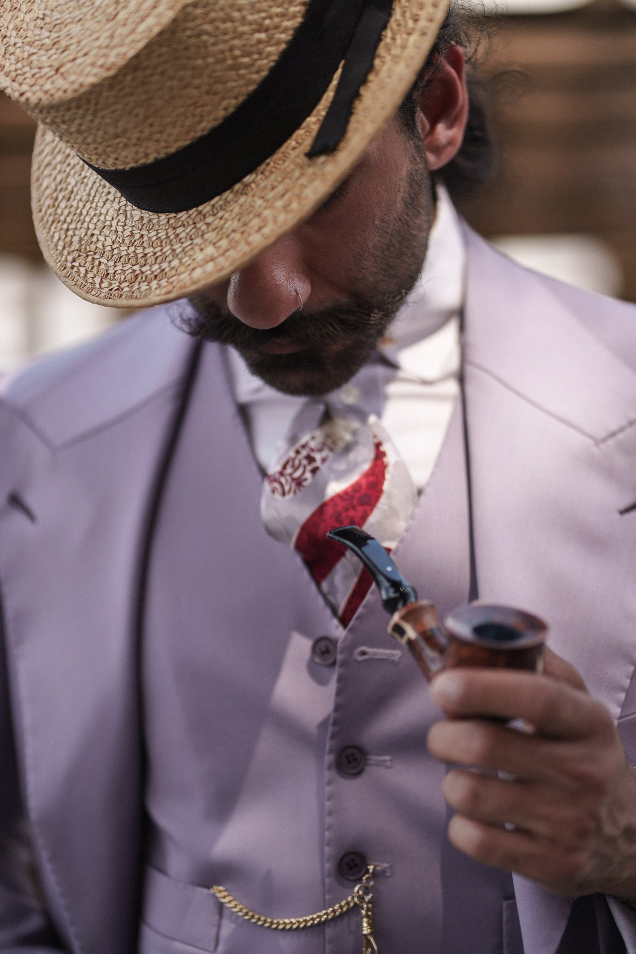 Tailoring detail from Pitti Uomo 110, lilac suit, straw hat, sunglasses and pocket watch chain